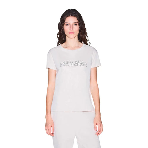 Armani Exchange T-shirt beige en coton à col rond pour femme, en tissu gris clair avec un logo discret et scintillant sur la poitrine.