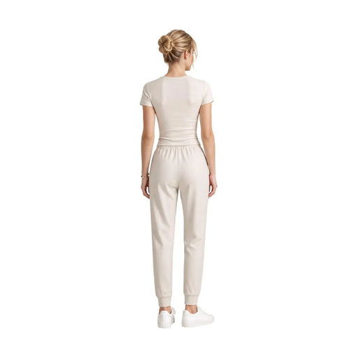 Ensemble t-shirt beige à manches courtes et pantalon de jogging assorti en coton pour femme par Armani Exchange
