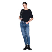 Black leather mini bag with chain strap paired with armani exchange women black cotton round neck t shirt