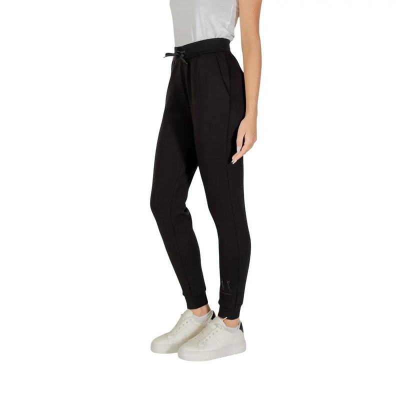 Armani exchange Pantalon de jogging noir pour femme avec taille élastiquée à cordon et détails discrets sur les coutures latérales.