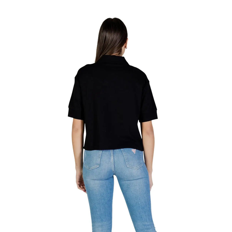 Armani Exchange women black cotton short-sleeved polo shirt with classic collar and cropped hem front view