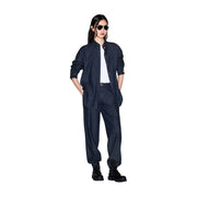 Navy blue oversized cotton button-down shirt with rolled sleeves and subtle collar detail for women