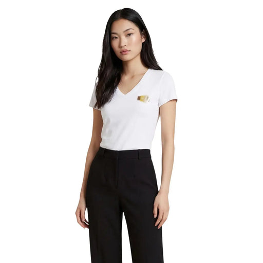 Armani Exchange T-shirt blanc en coton pour femme, col en V, manches courtes, avec petit logo doré sur la poitrine gauche