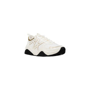 Armani Exchange women gold lace rubber sneakers in white and black with chunky soles and gold-tone logo detailing