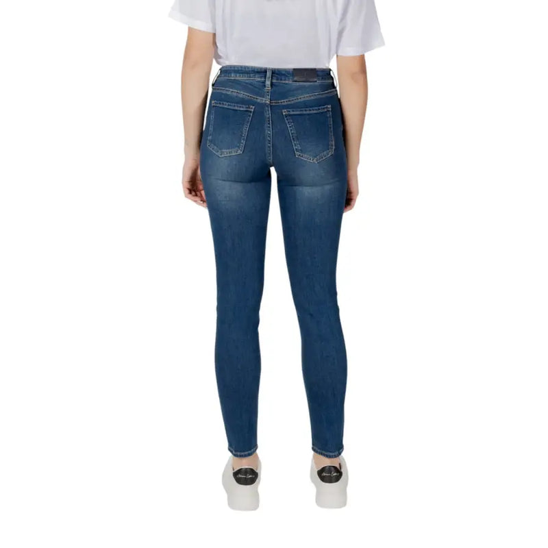 Dark blue slim fit denim jeans with classic back pockets shown from the back for Armani Exchange women