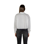 Armani Exchange women white cotton long sleeve button shirt featuring a sleek light gray satin blouse style