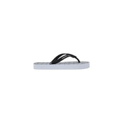 Armani Exchange women white rubber flip flops with black and white straps and a grid-patterned sole