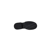 Black rubber sole with textured tread pattern and embossed armani exchange logo on womens leather moccasin slippers