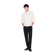 Armani Exchange Pull en laine crème pour homme, col rond et manches longues, porté par un mannequin