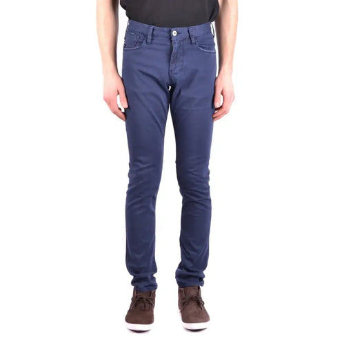 Dark blue slim fit jeans with white stitching and a classic five-pocket design.