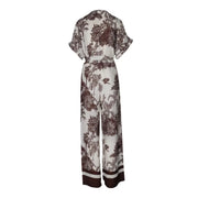 Combinaison Artigli pour femme, beige en viscose, col en V, imprimé botanique blanc et marron, manches courtes et ceinture à la taille.