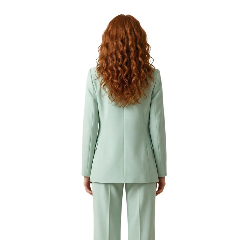 A woman wears an Artigli women green polyester blazer with lapel collar and structured shoulders in light mint green