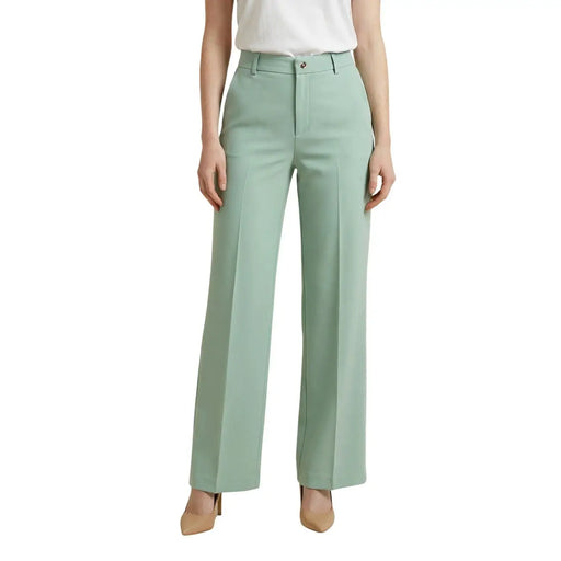 Pantalon Artigli pour femme en polyester stretch vert menthe, coupe ajustée à jambes larges et plis discrets sur le devant.
