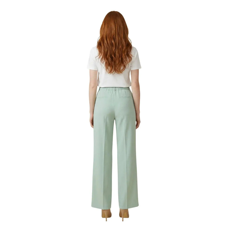 Pantalon Artigli pour femme en polyester stretch vert menthe, coupe ample et jambes larges, taille élastiquée.