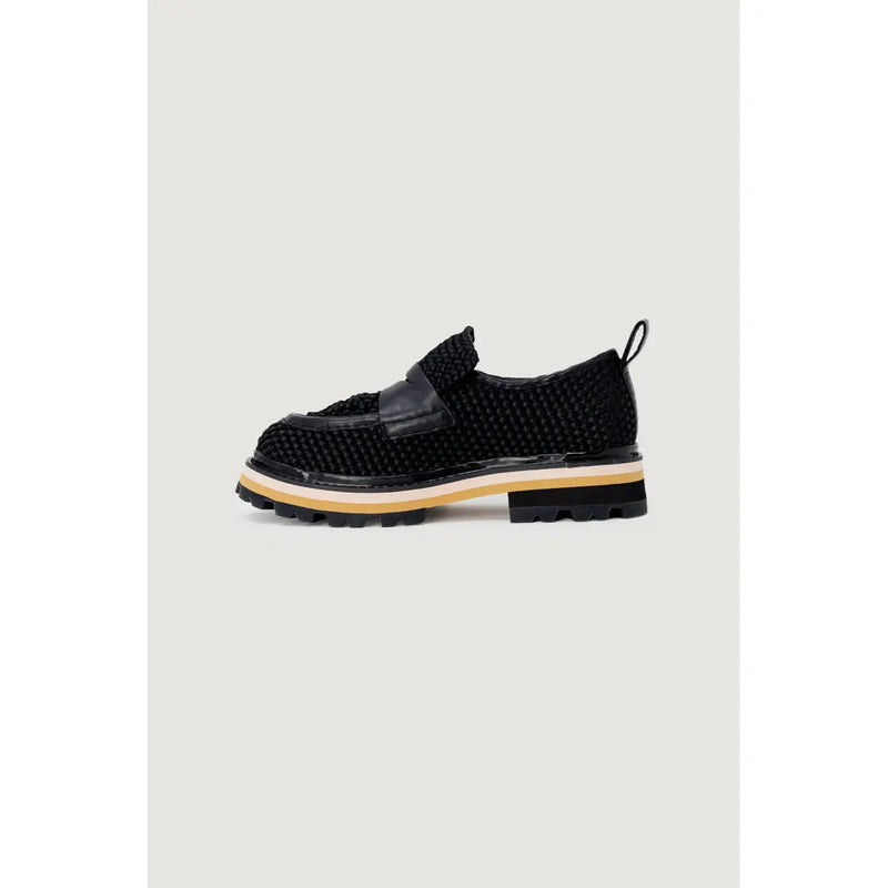 Black woven loafer with glossy black leather strap and chunky tan white and black platform sole by Ash women