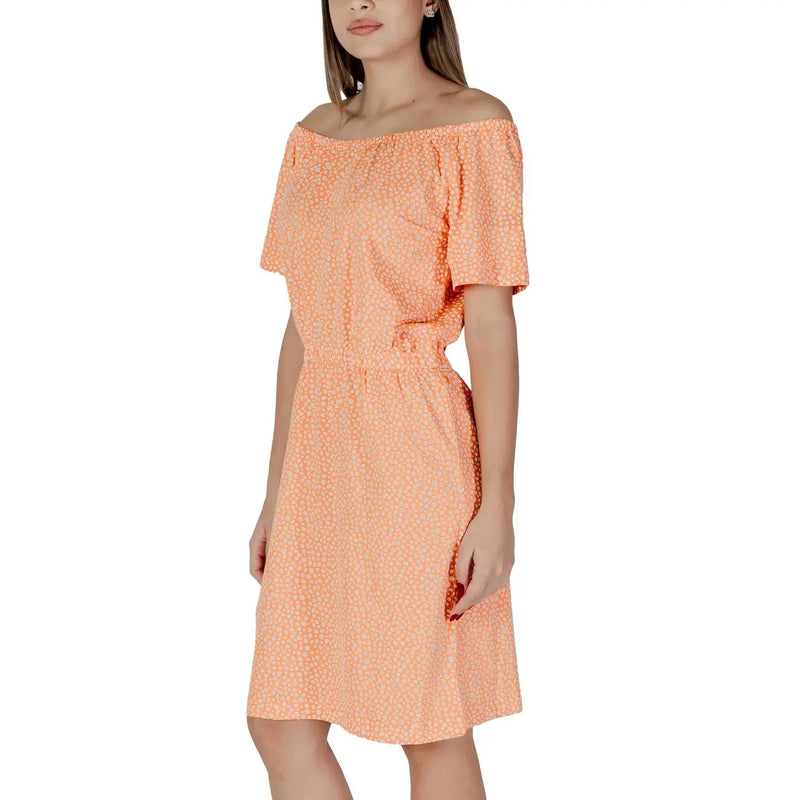 A soft peach b.young orange polka dot short off-the-shoulder dress with delicate white dot pattern and short sleeves
