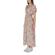 A flowing light pink floral cotton maxi dress with short flutter sleeves and self-tie waistband by B.young