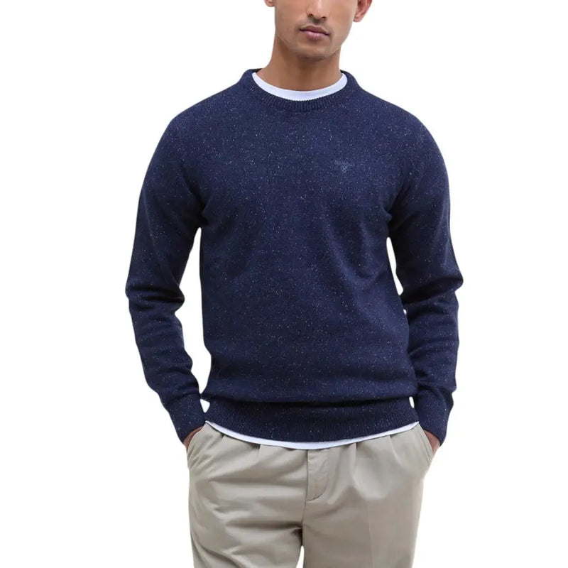 Navy blue speckled crewneck sweater with white trim and ribbed cuffs, inspired by j.crew’s classic style.