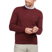 Maroon textured sweater with a crew neck and subtle logo on the chest.