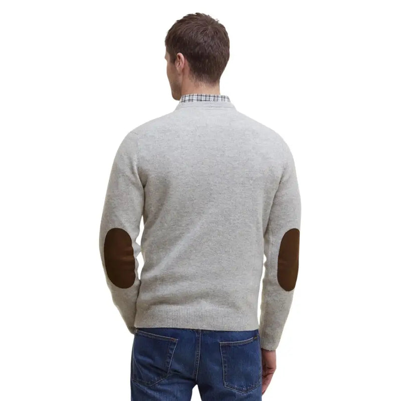 Light gray sweater with brown elbow patches and plaid collar, likely made of wool or cotton blend.
