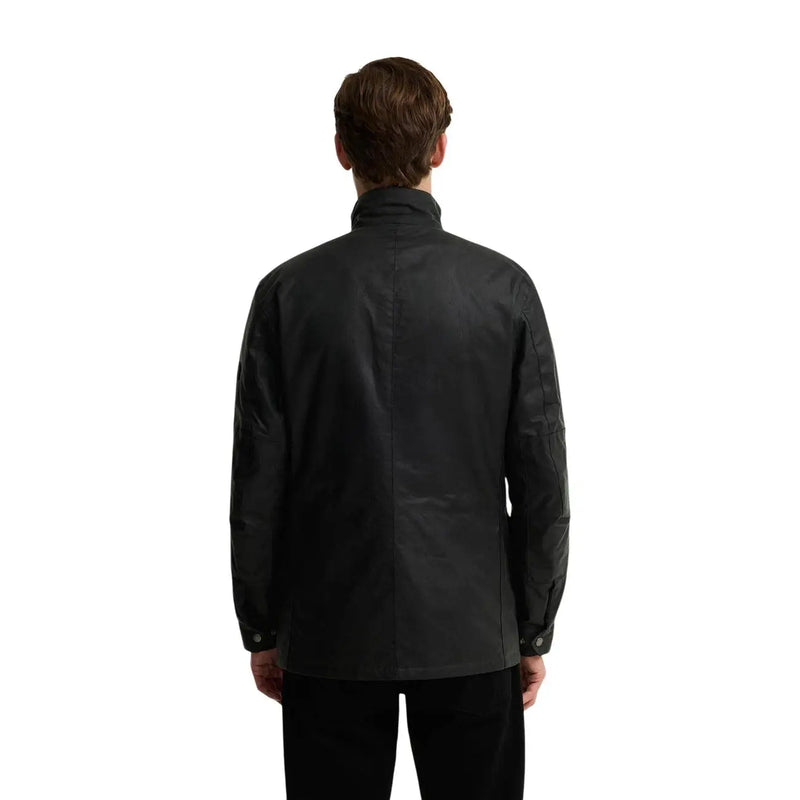 Veste cirée Barbour International pour homme, en coton vert, style duke, avec col montant en cuir noir et poignets boutonnés.