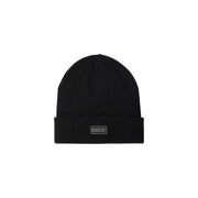 Bonnet Barbour International en laine noire pour homme, avec bord-côtes et écusson de la marque, vue de face
