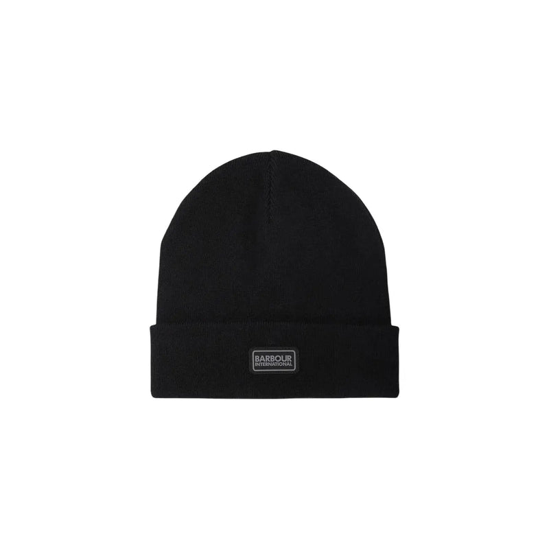 Bonnet Barbour International en laine noire pour homme, avec bord-côtes et écusson de la marque, vue de face