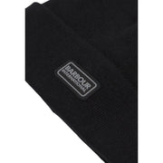 Bonnet Barbour International en laine noire pour homme, avec logo rectangulaire, vue de face