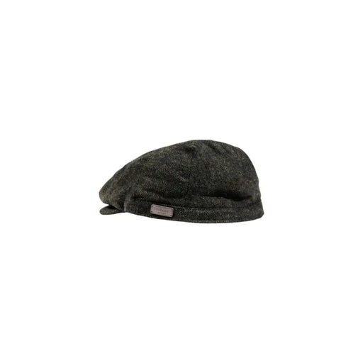 Tweed flat cap with a textured pattern and dark green color.