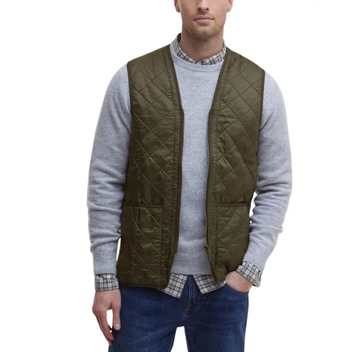 Olive green quilted vest with a ribbed knit collar and cuffs, likely made of cotton or polyester blend.