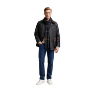 Veste Barbour pour homme en coton marron patchwork ciré, manches en cuir noir texturé avec un empiècement sur la poitrine gauche