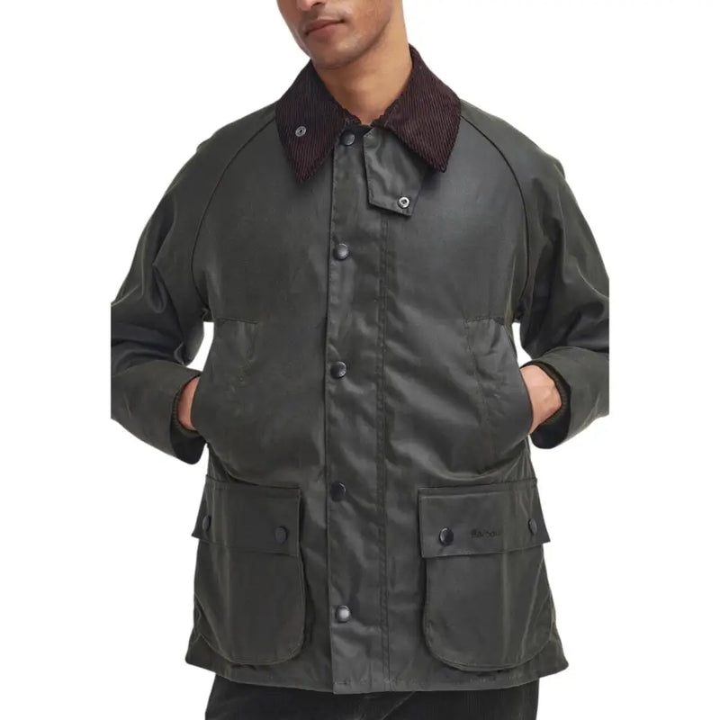 Men’s olive green waxed cotton blazer with corduroy collar and multiple pockets