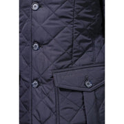 Veste matelassée Barbour Lutz pour homme, bleu marine foncé, avec surpiqûres en losange et boutons assortis, vue de face