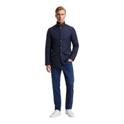 Veste matelassée Barbour Lutz pour homme, bleu marine, fermeture boutonnée et deux poches avant, vue de face