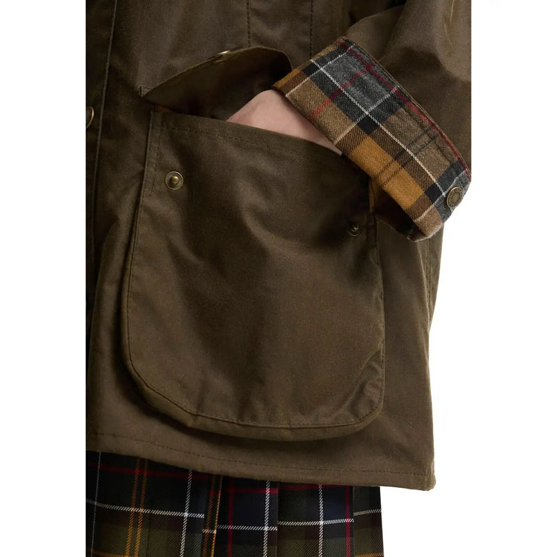 Barbour women beige cotton wax bedale blazer with brown waxed cotton jacket featuring plaid cuff and tartan trousers
