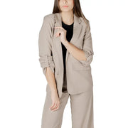 Beige blazer suit with rolled-up sleeves and a sleek tailored fit made from high-quality fabric