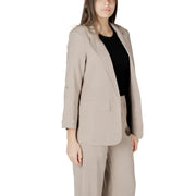 Beige blazer suit with a sleek tailored fit and subtle textured fabric perfect for formal wear