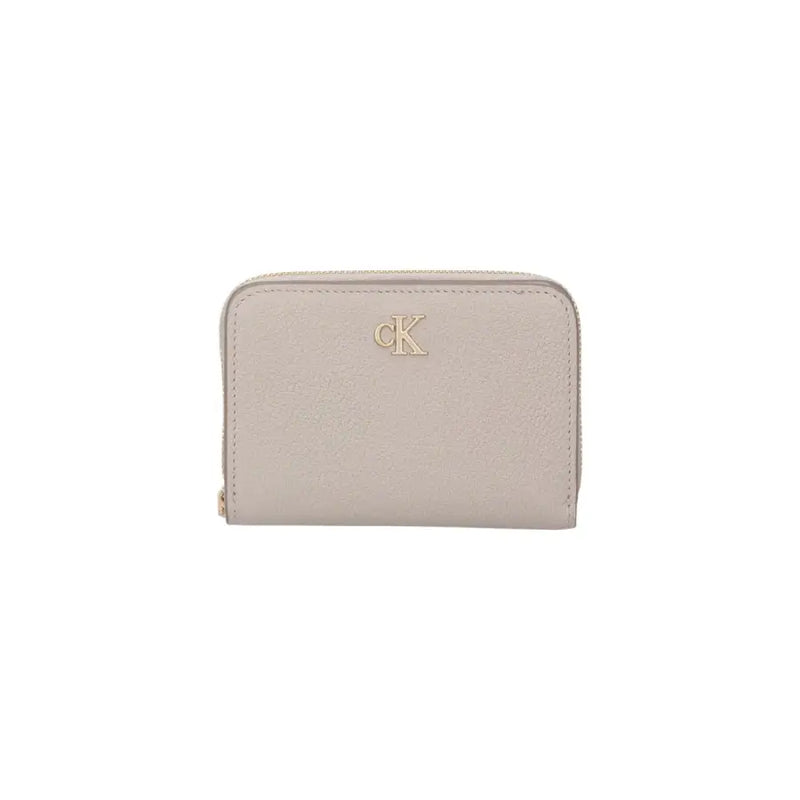 Beige Calvin Klein wallet displayed with black zipper in the Calvin Klein Black Zippered Wallet product image