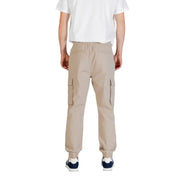 Beige cargo pants from Calvin Klein Jeans featuring side pockets and elastic cuffs in durable cotton material