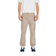 Beige cargo pants from Calvin Klein Jeans with side pockets and elastic cuffs for casual and functional wear