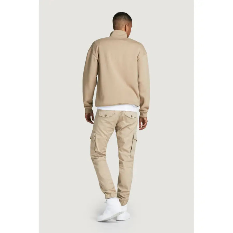 Beige cotton jack and Jones mens cargo trousers with side pockets and elastic cuffs for casual wear