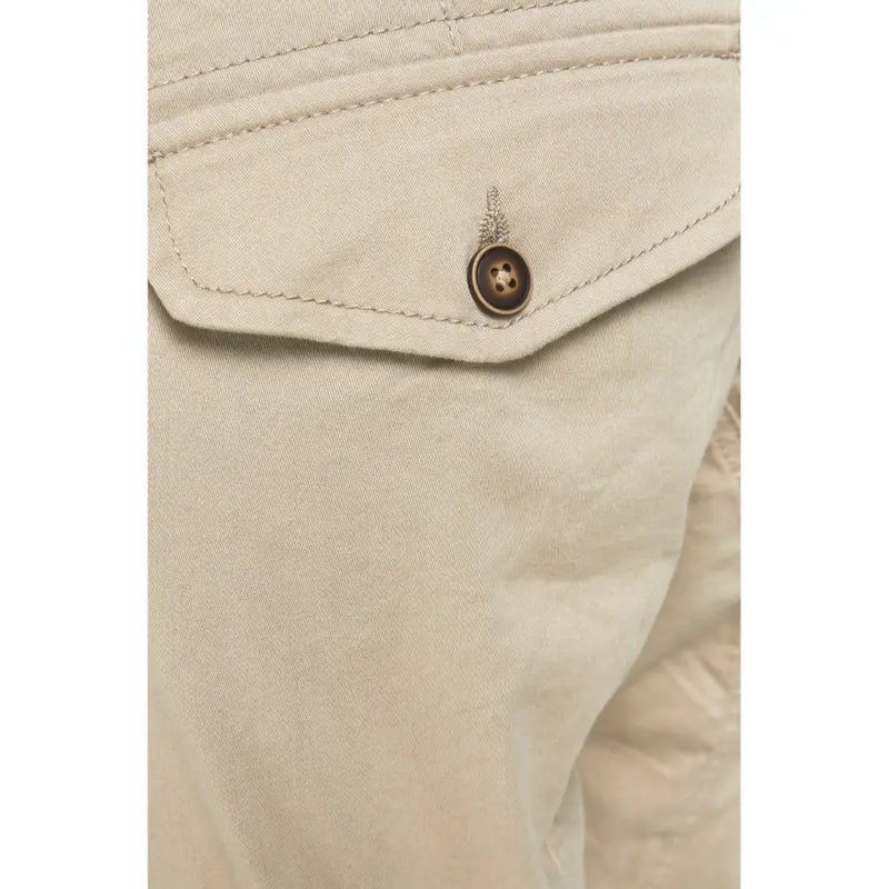 Beige cotton Jack Jones mens cargo pants with pockets featuring a brown button with an ornate metallic top