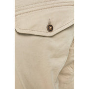 Beige cotton Jack Jones mens cargo pants with pockets featuring a brown button with an ornate metallic top