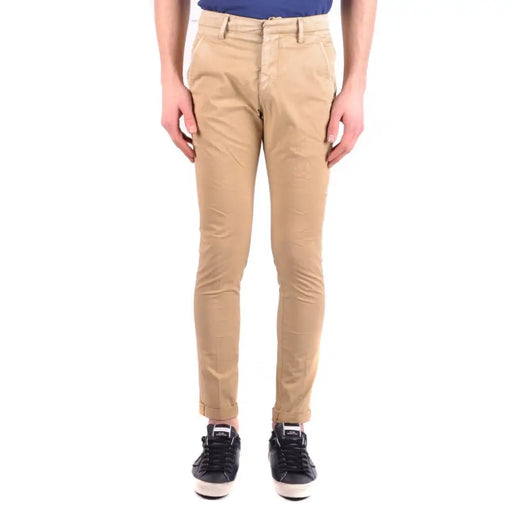 Men’s slim-fit beige chinos with cuffed hems from Dondup Spring Summer collection
