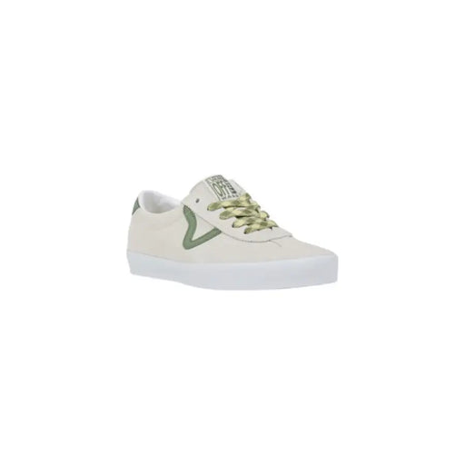 Beige and green Vans low top skate sneakers shown in product image