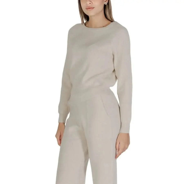 Clerè Women’s Beige Knit Sweater with Round Neck in elegant knitwear set display