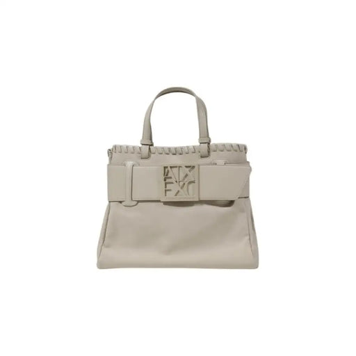 Beige leather handbag with top handles buckle and shoulder strap for elegant carrying