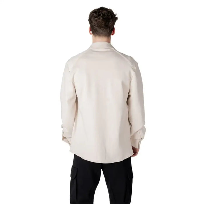 Beige long-sleeved shirt displayed as Beige Overshirt for Men in a stylish setting