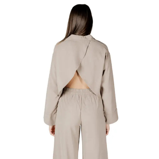 Beige open-back top and pants set in the Beige Two Piece Open Back Pantsuit