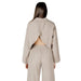 Beige open-back top and pants set in the Beige Two Piece Open Back Pantsuit